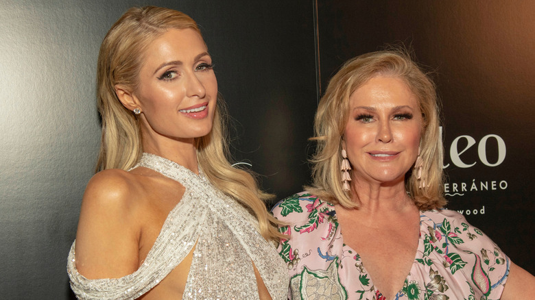 Paris and Kathy Hilton at an event, smiling