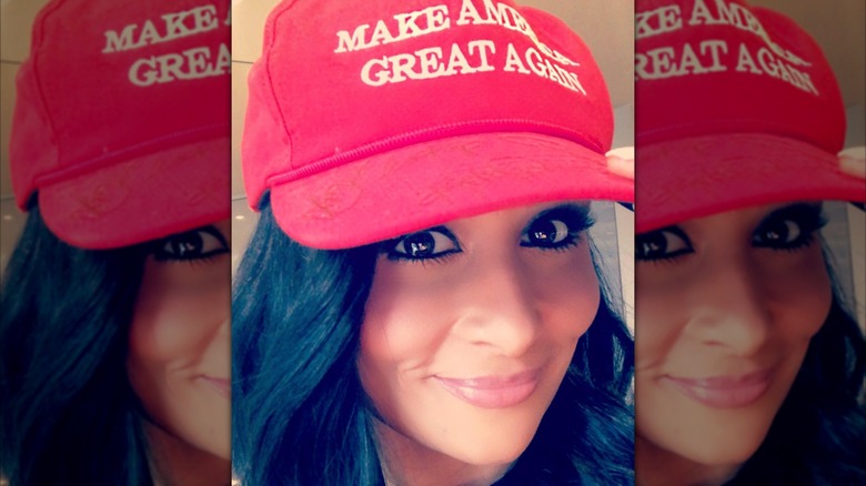 Katrina Pierson smiling, wearing a MAGA hat