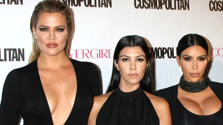 Kim posing with Kourtney Kardashian