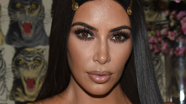 Kim Kardashian in gold hair clips