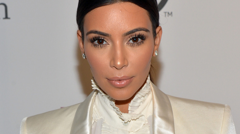 Kim Kardashian in diamond earrings