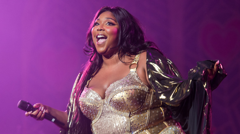 Lizzo performing onstage