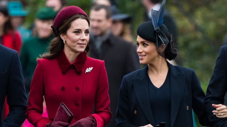 Kate Middleton and Meghan Markle walking