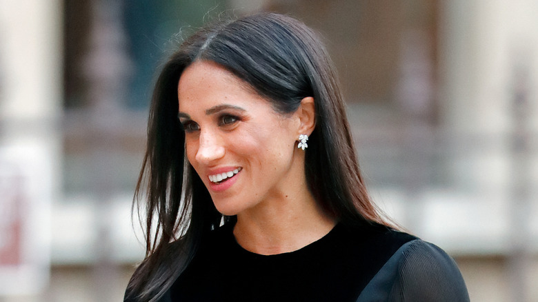 Meghan Markle in a black dress in 2018