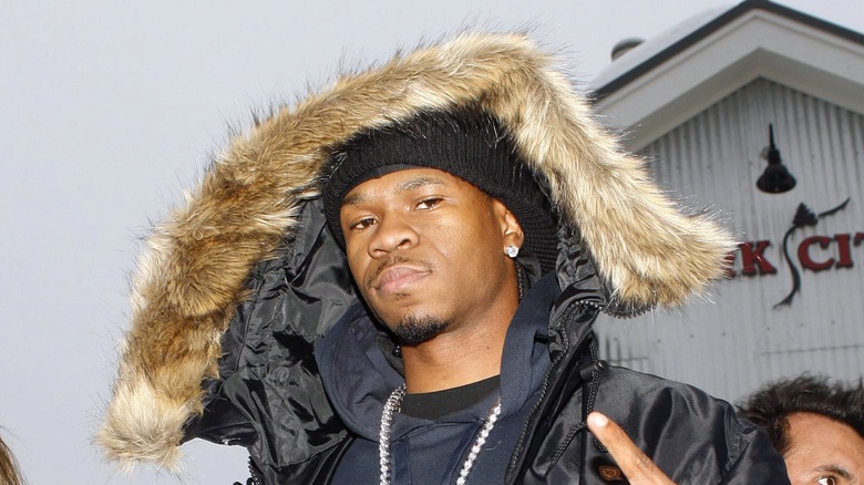 Chamillionaire stands in black parka