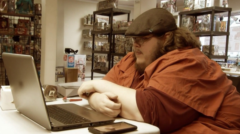 Justin looking at computer on My 600-lb Life