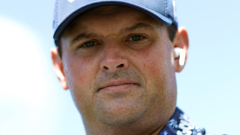 Patrick Reed, posing