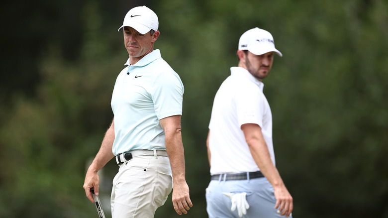 Rory McIlroy and Patrick Cantlay wearing white