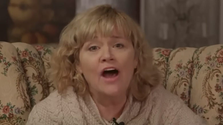 Samantha Markle floral couch white sweater