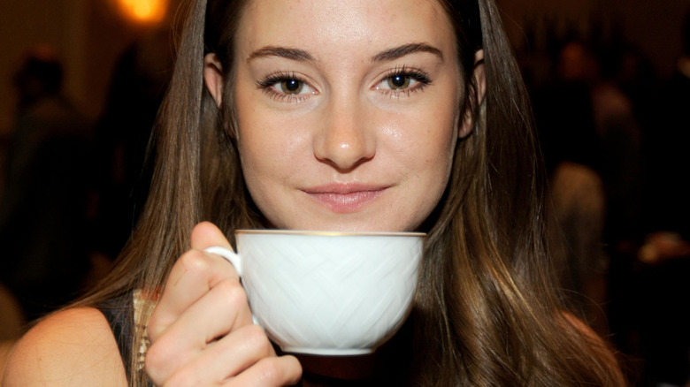 Shailene Woodley holding teacup
