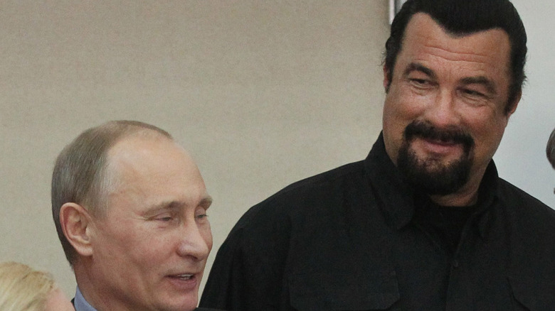 Steven Seagal smiling at Vladimir Putin