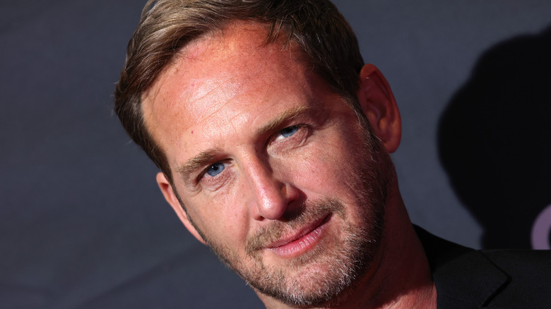 Josh Lucas posing for cameras