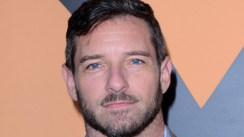 Ian Bohen posing for cameras