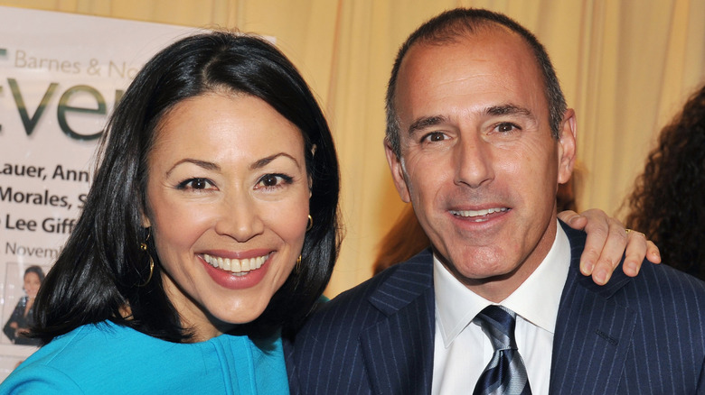 Ann Curry posing and smiling next to Matt Lauer