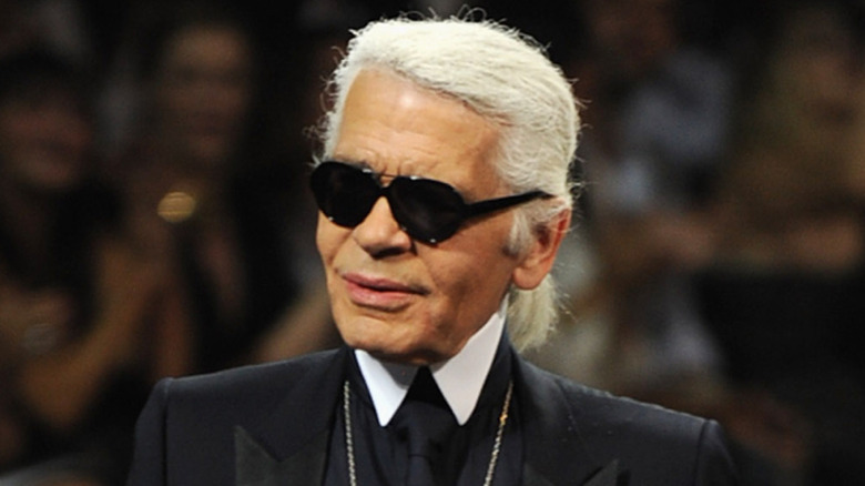 Karl Lagerfeld in silver necklace