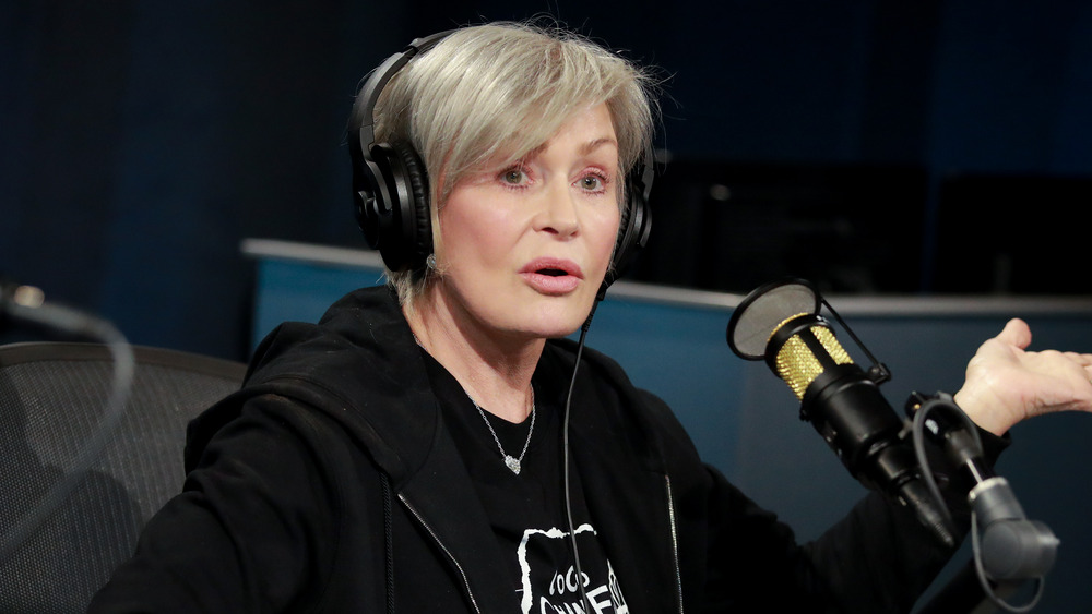 Sharon Osbourne wearing headphones