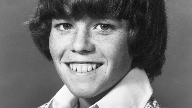 Mike Lookinland posing for 1970s photoshoot