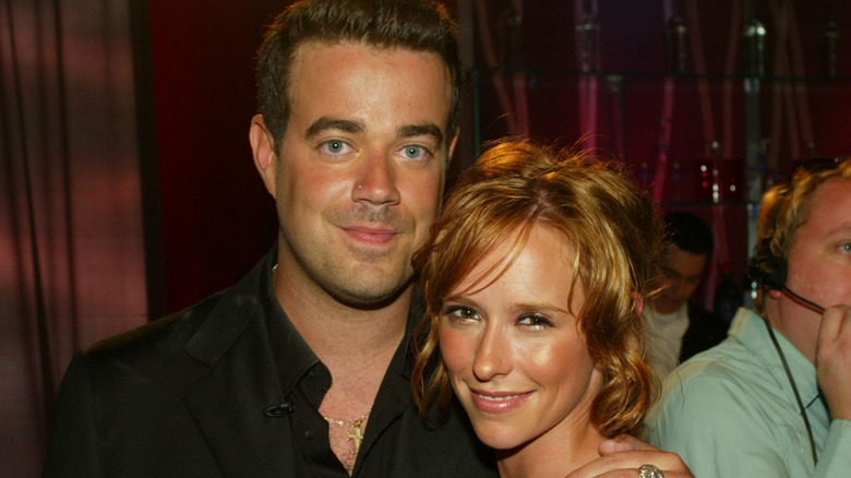 Carson Daly with his arm around Jennifer Love Hewitt