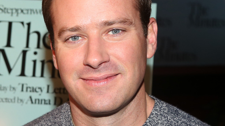 Armie Hammer poses in 2020