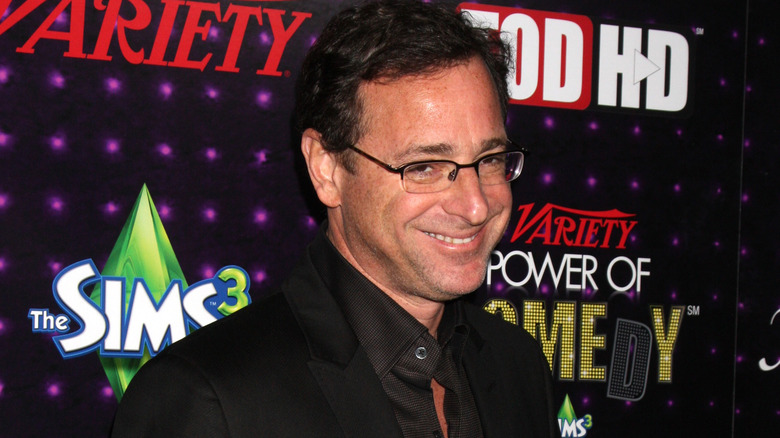 Bob Saget wearing glasses