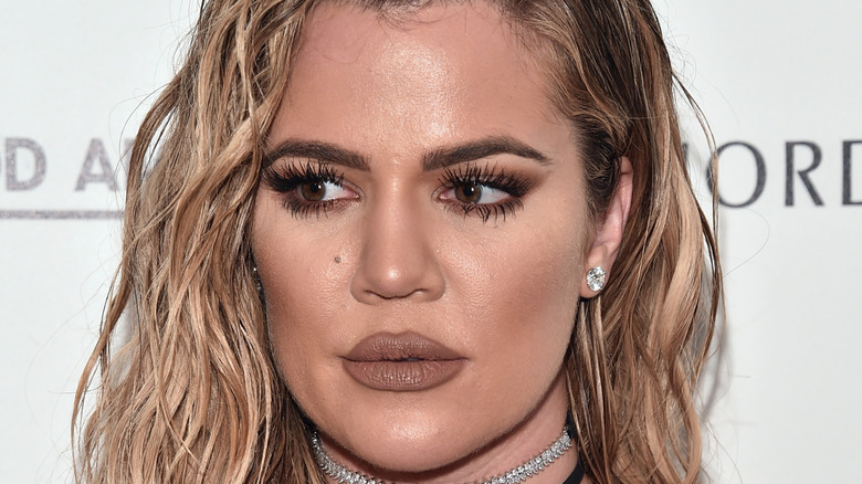 Khloé Kardashian looking away