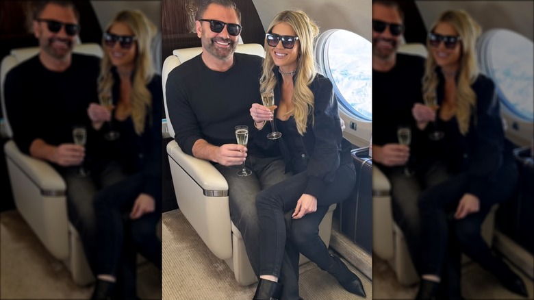 Christina Haack posing with Christoper Larocca on a private plane.