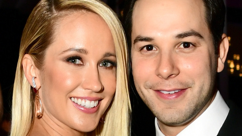 Anna Camp Skylar Astin smiling