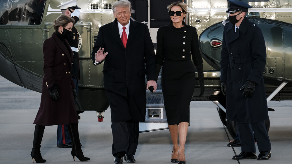 Donald Trump and Melania Trump walking