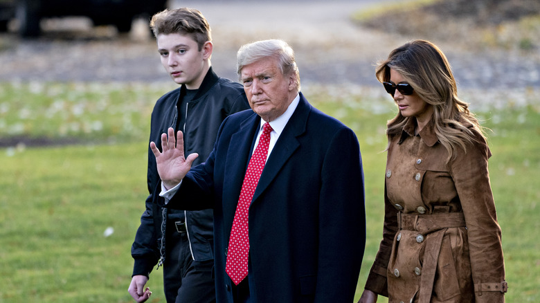 Barron Trump with his parents in 2019