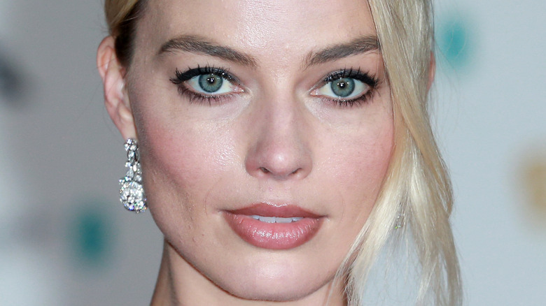 Margot Robbie with diamond earrings