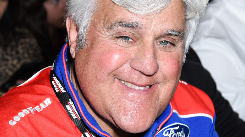 Jay Leno attending a NASCAR event 