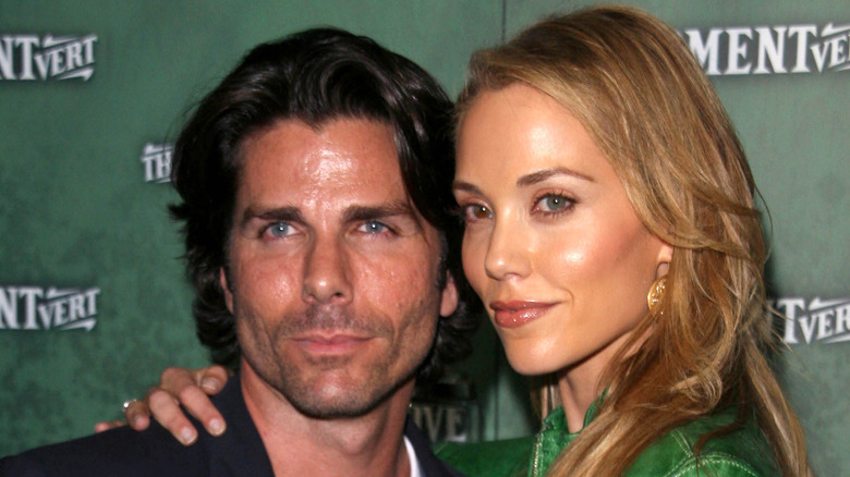 Elizabeth Berkley and Greg Lauren smiling
