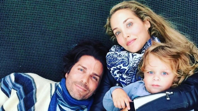 Elizabeth Berkley and Greg Lauren with their son Sky