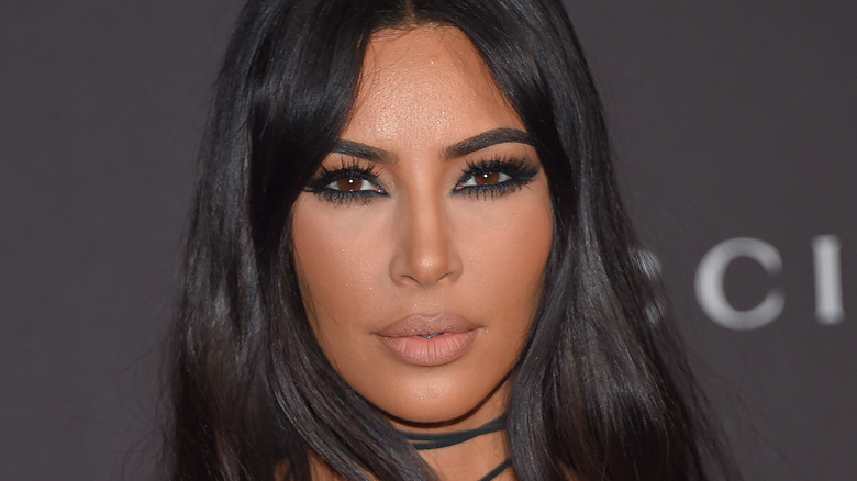 Kim Kardashian wearing a black necklace