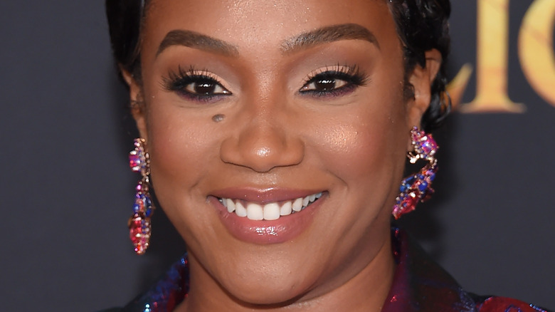 tiffany haddish short hair jewel earrings