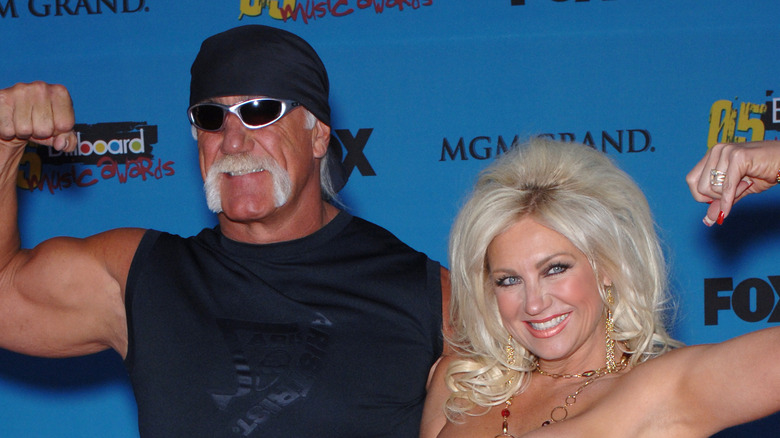 Hulk Hogan and Linda Hogan flexing