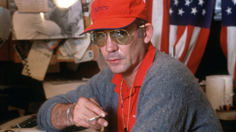 Hunter S. Thompson in front of American flag