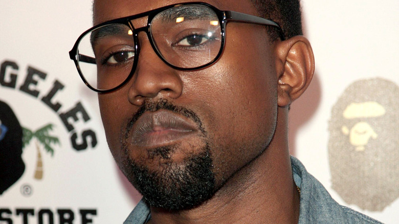 Kanye West wearing glasses