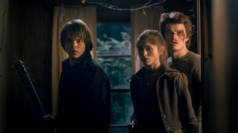 Jonathan (Charlie Heaton) with Nancy (Natalia Dyer) and Steve (Joe Keery) in "Stranger Things"