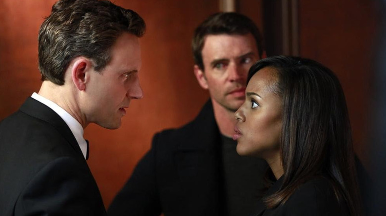 Fitz (Tony Goldwyn) stares at Olivia (Kerry Washington) while Jake (Scott Foley) looks on in "Scandal"