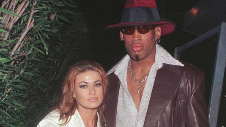 Carmen Electra and Dennis Rodman hugging