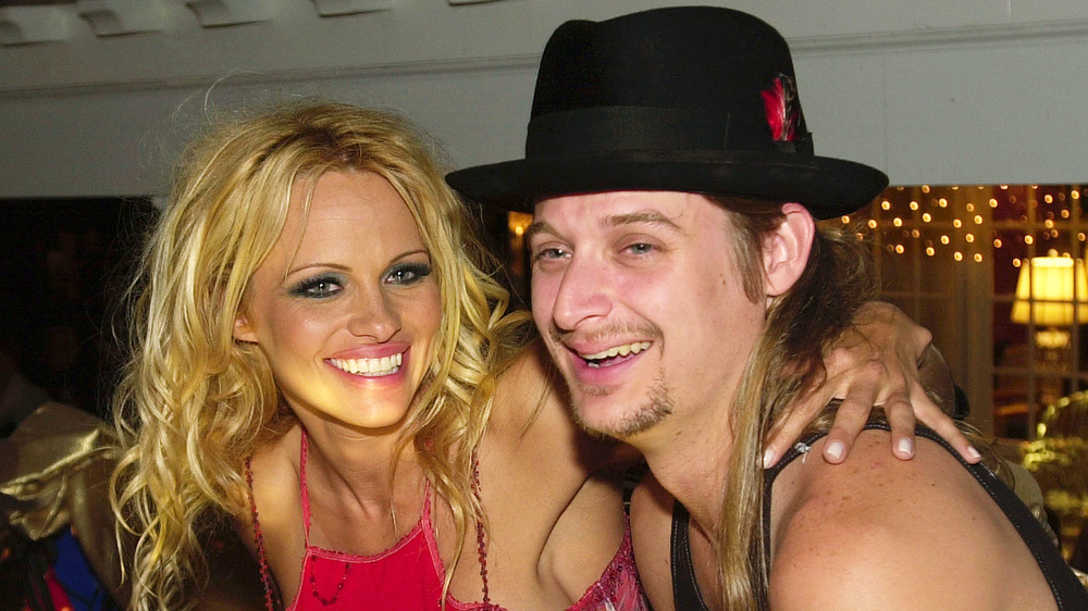 Pamela Anderson and Kid Rock laughing 