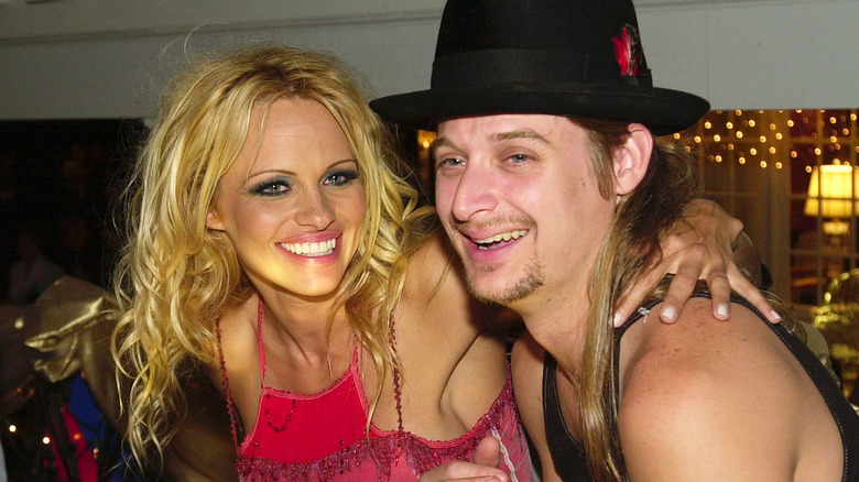 Pamela Anderson and Kid Rock laughing