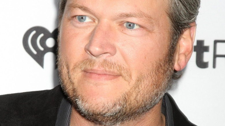 Blake Shelton with a neutral expression