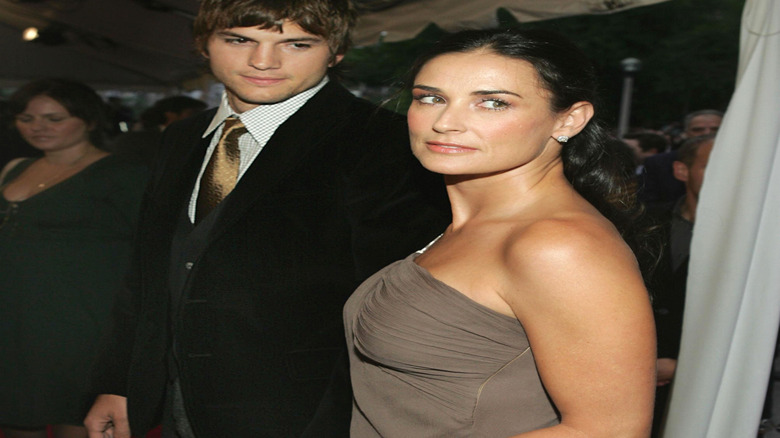 Ashton Kutcher checking out Demi Moore