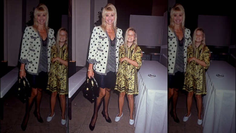 Ivanka Trump wearing a black and gold dress and posing with Ivana Trump at a 1992 Chanel fashion show