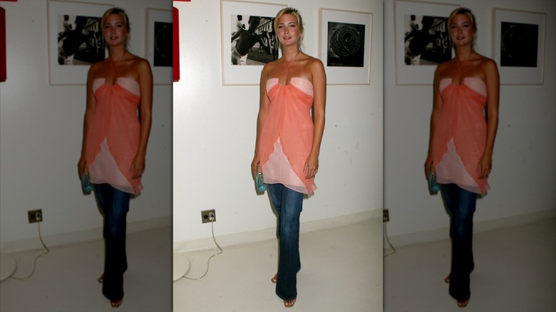 Ivanka Trump wearing pink top and flared jeans at Soho House in 2004