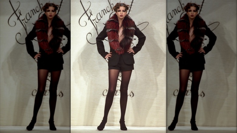 Ivanka Trump wearing fur-trimmed outfit on the runway at a 1999 Franck Sorbier fashion show