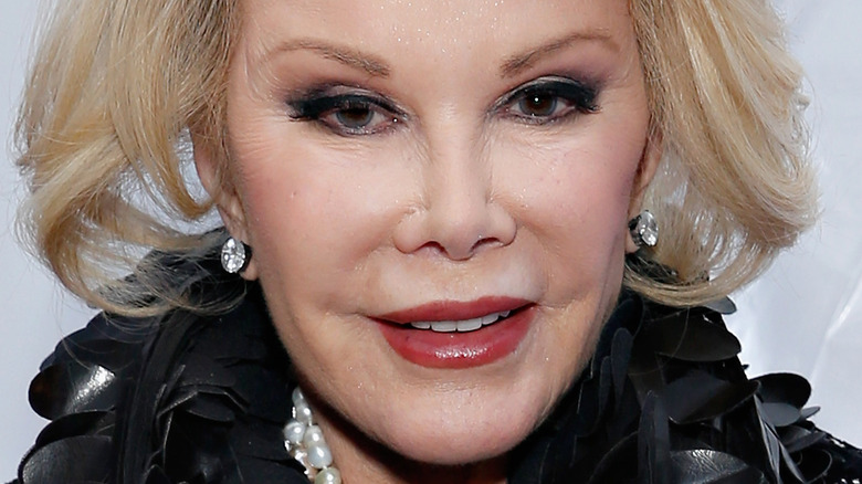 Joan Rivers poses at an event
