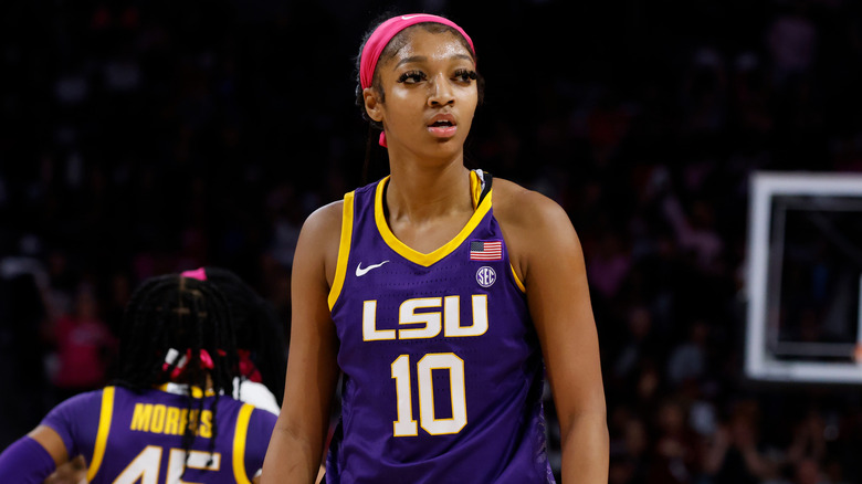 Angel Reese standing on the basketball court